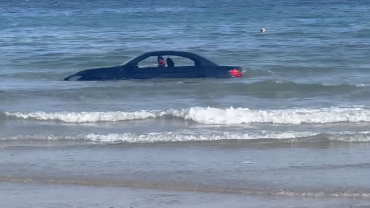 BMW driver told: ‘You can’t park there’ as car floats out to sea