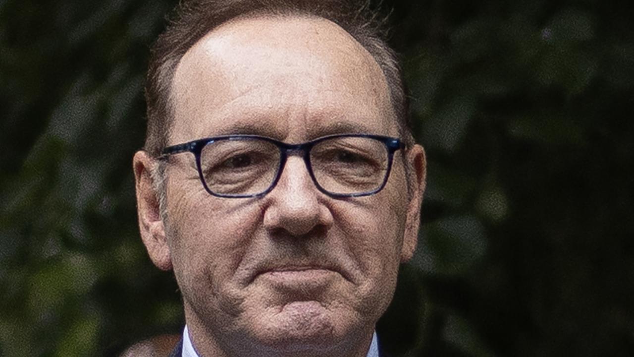 Kevin Spacey: Actor smiles as he arrives at court to face sex assault charges