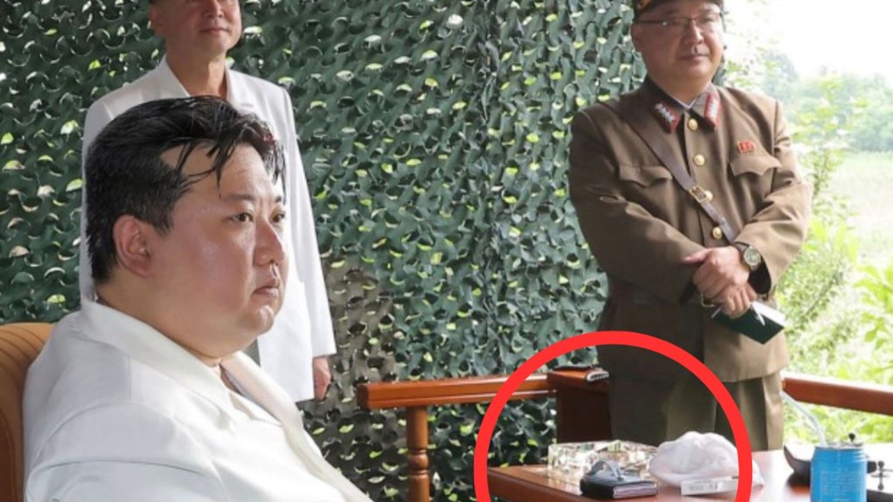 North Korea’s Kim Jong-un pictured with foldable smartphone at ballistic launch