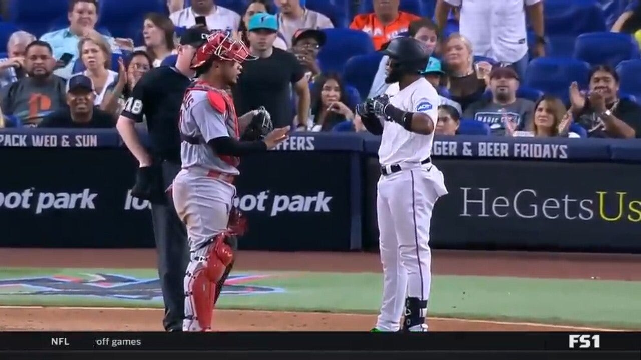 Cardinals' Willson Contreras and Marlins' Bryan De La Cruz exchange words at the plate in the seventh inning