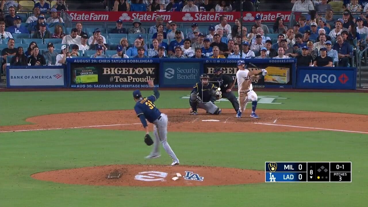 Austin Barnes launches a solo home run to left field to give the Dodgers a late lead over the Brewers