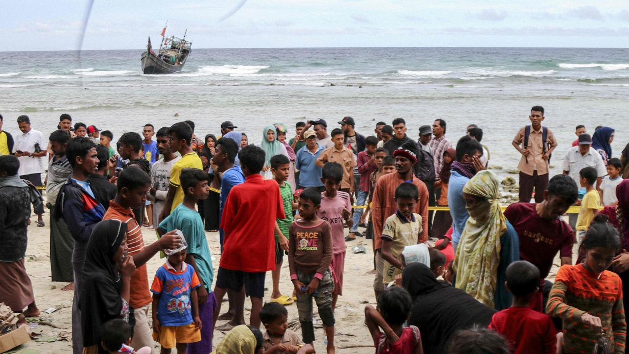 More than 100 Rohingya refugees on boat land in Aceh, Indonesia