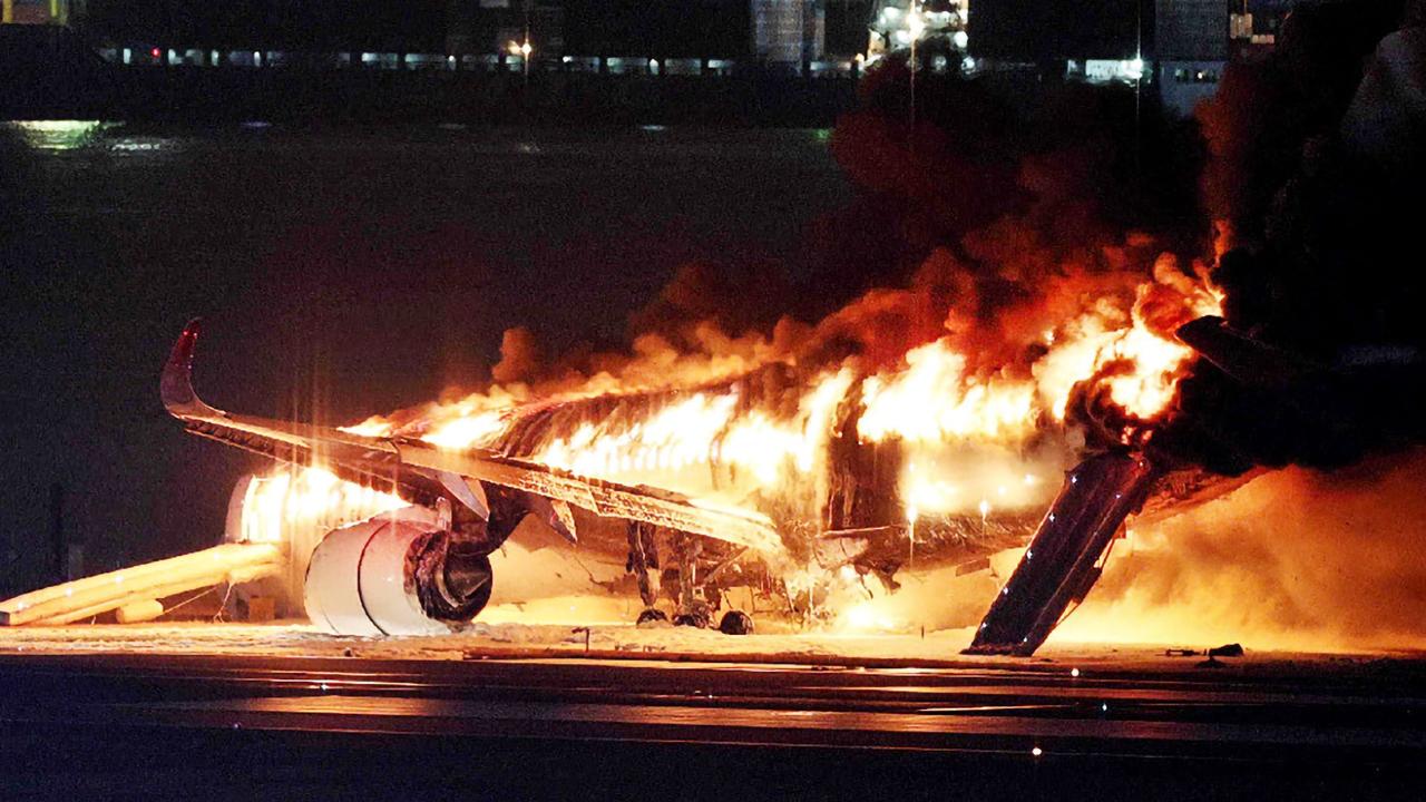 Japan plane crash: Japan airlines passenger plane explodes into flames during landing at Haneda Toyko airport